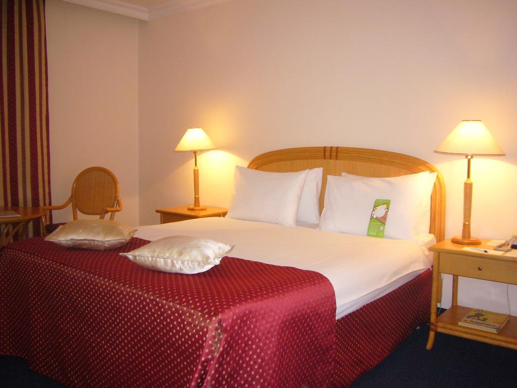 Hotel Ramada By Wyndham Center